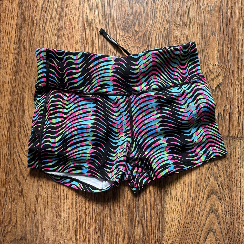 Nike Women's Black Athletic Shorts with Neon Wave Pattern